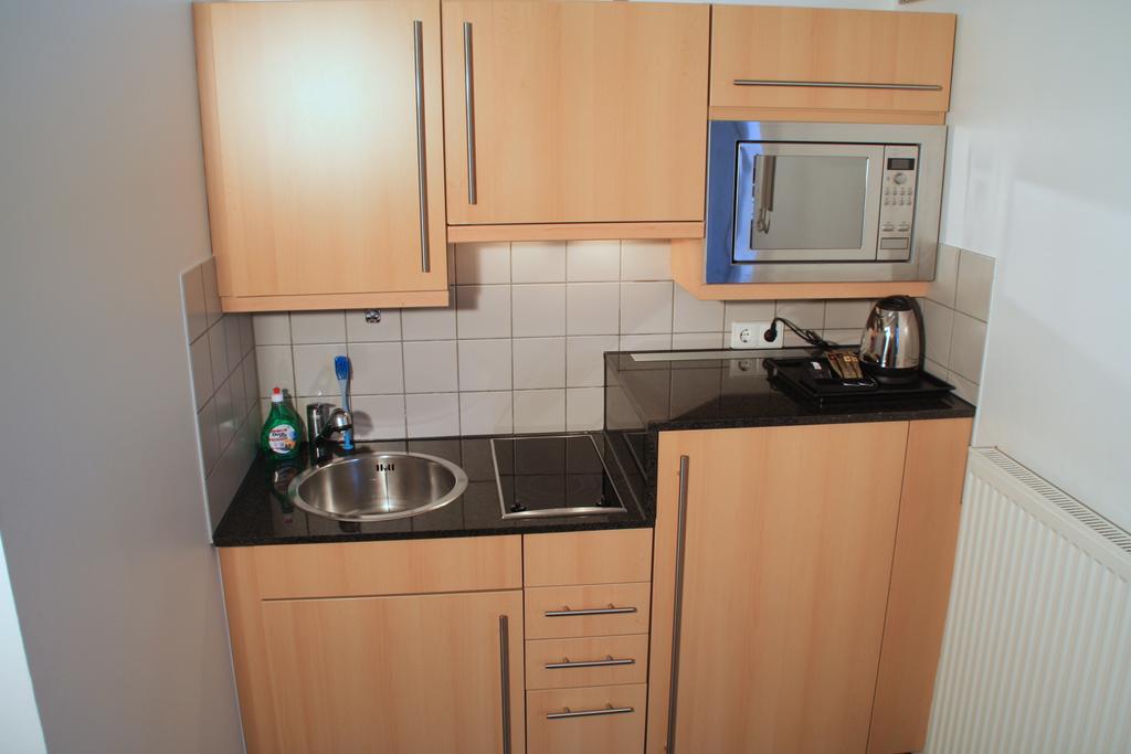 Essen City Suites Стая снимка
